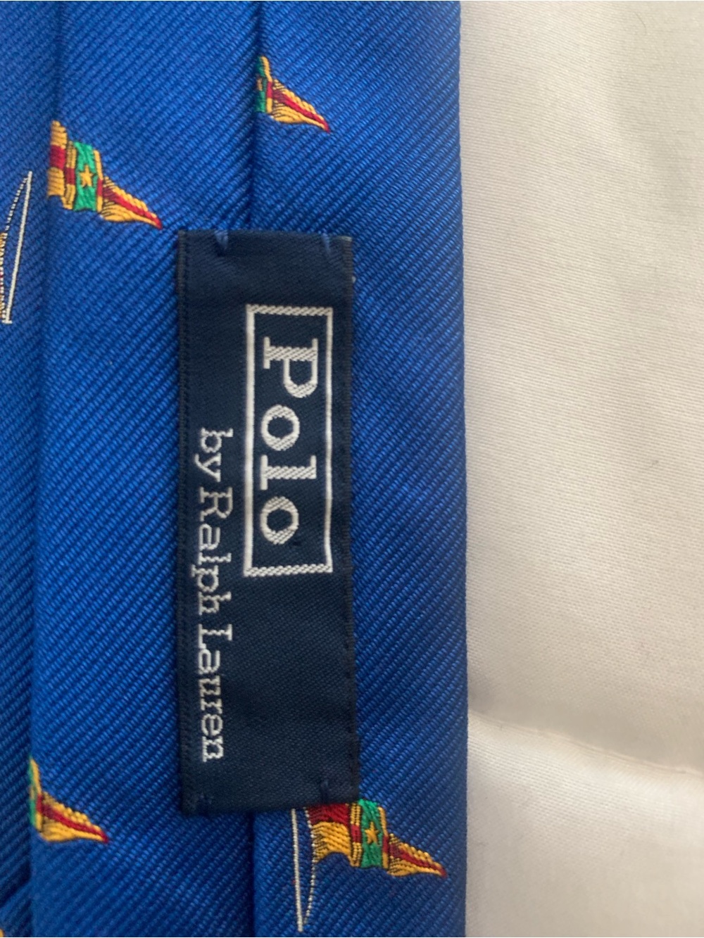 Ralph Lauren Bright Blue Tie with Tiny Multicolor Flag Motif